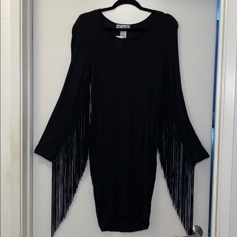 Plus size black shingle trimmed mini dress